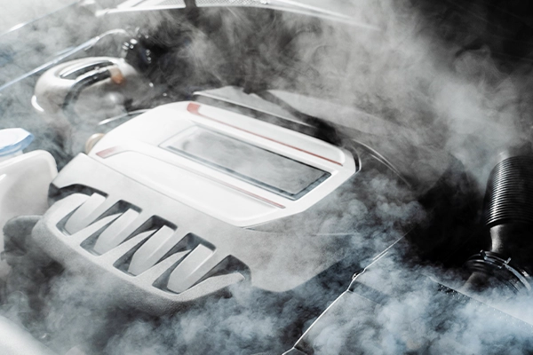 Smoke coming from open engine bay